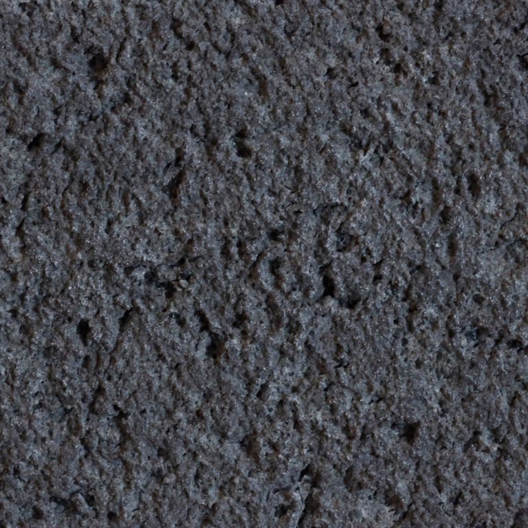 Color/Finish variation image for Basalt - Basalto. The surface finish shown is waterjet. The dominant color shown is black; with green, purple and tan secondaries. The color mix creates a warm feeling. Solid color pattern. Contains voids.