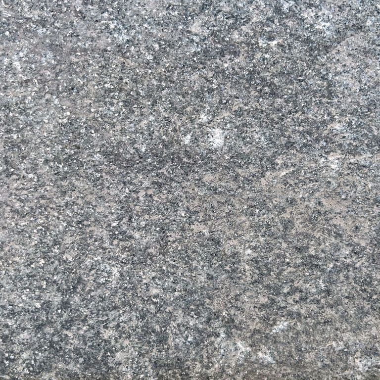 Color/Finish variation image for Reclaimed Quartzite Plank Pavers - Blue/Gray. The dominant color shown is gray; with beige, blue, brown, green, purple and white secondaries. The color mix creates a cool feeling. Regular, fine speckled and random color patterns. Contains some mica.