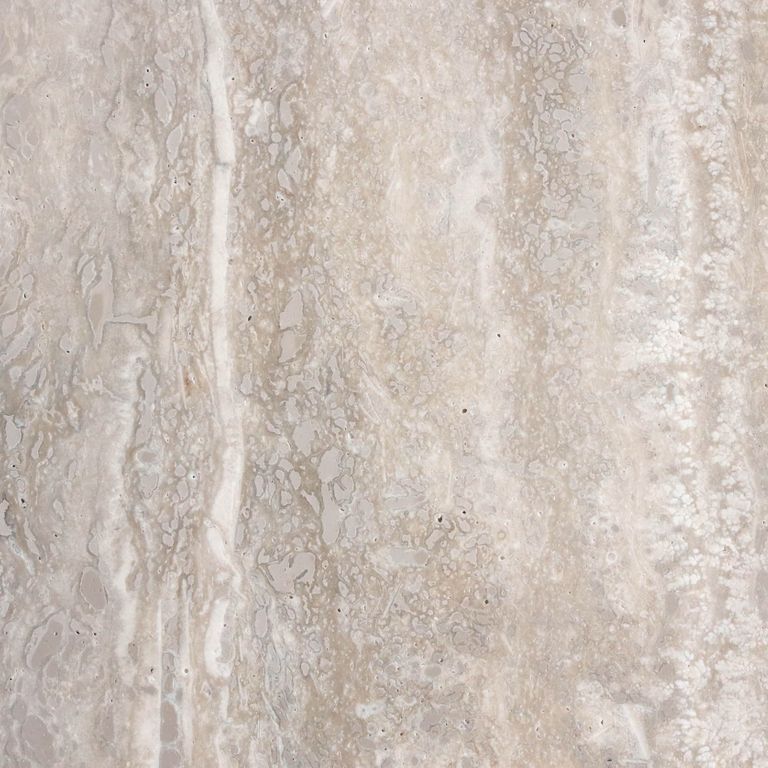 Color/Finish variation image for Campione Beige Travertine. The surface finish shown is honed. The dominant color shown is beige. The color mix creates a warm feeling. Streaked and blotched color patterns.