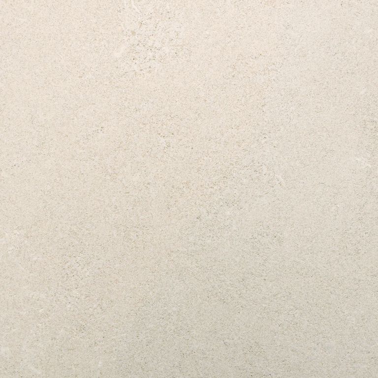 Best close-up image for Variegated Limestone. The surface finish shown is honed. Dominant colors shown are beige and cream. The color mix creates a warm feeling. Regular color pattern.