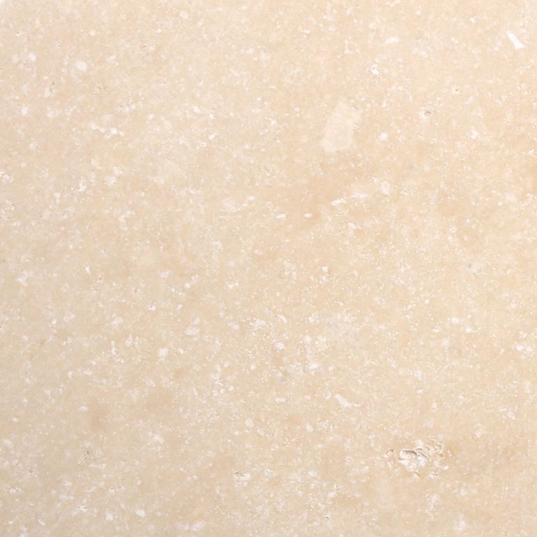 Feature image for Tuscany Beige® Travertine. The surface finish shown is tumbled. Dominant colors shown are beige, orange/rust and tan. The color mix creates a warm feeling. Cloudy color pattern. Contains voids.