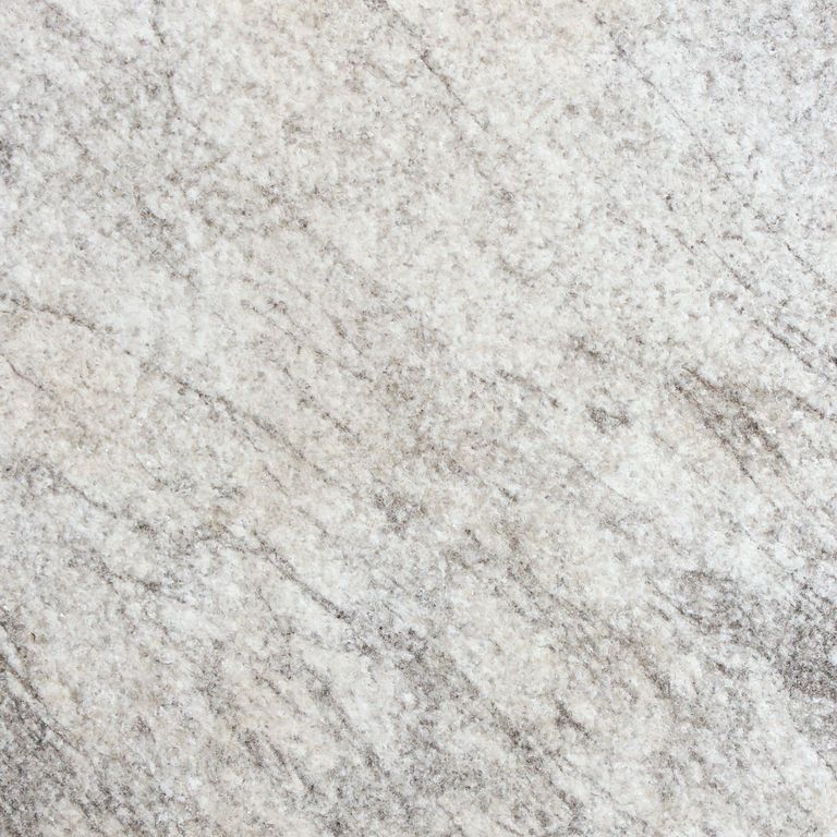 Feature image for Sky® Marble. The surface finish shown is sand blasted. The dominant color shown is gray. Exhibits 