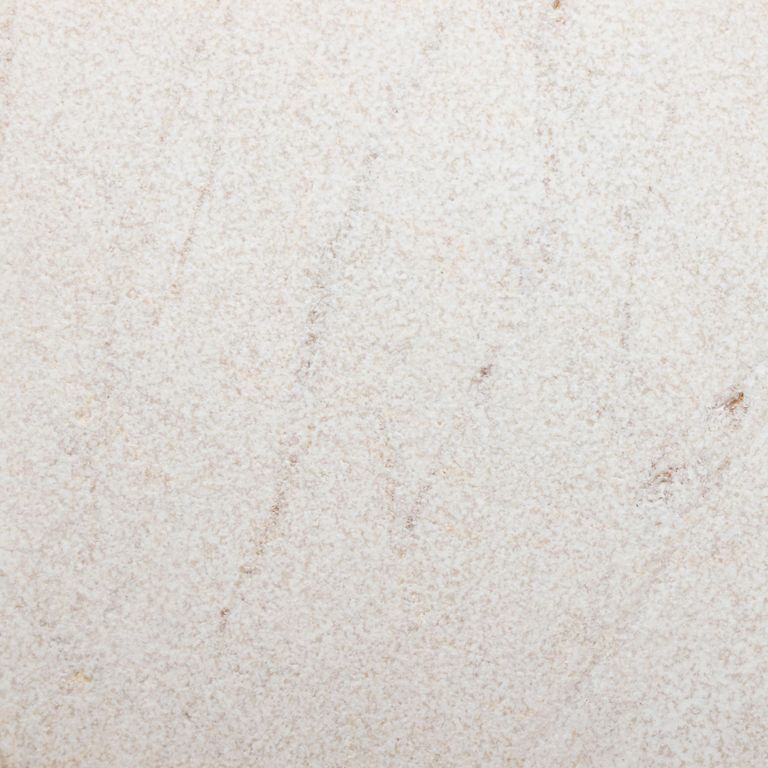 Feature image for Pearl Cream® Marble. The surface finish shown is sand blasted. The dominant color shown is gray. Exhibits 