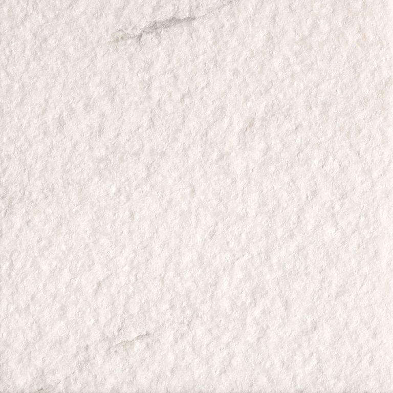 The surface finish shown is bush hammered. Dominant colors shown are white and cream. The color mix creates a warm feeling. Speckled and fine speckled color patterns.