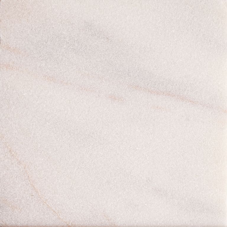The surface finish shown is sand blasted. Dominant colors shown are beige, pink, white and cream. The color mix creates a warm feeling. Solid and regular color patterns.