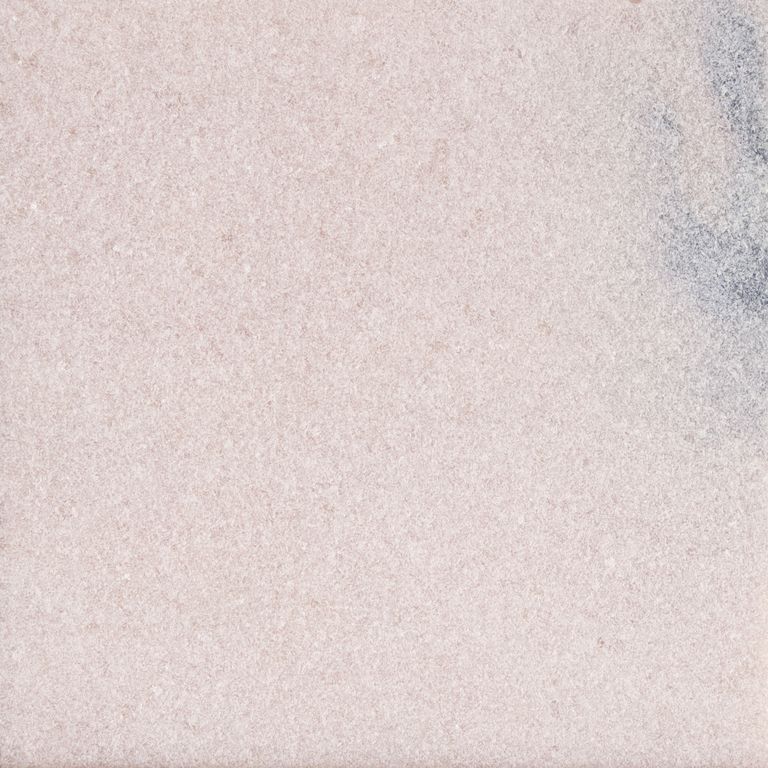 The surface finish shown is sand blasted. Dominant colors shown are beige and white. The color mix creates a cool feeling. Solid and regular color patterns.