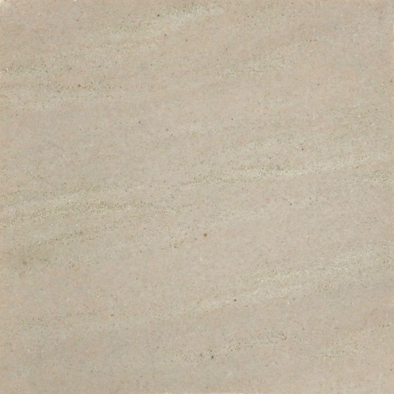 The surface finish shown is honed. Dominant colors shown are beige and tan. The color mix creates a warm feeling. Solid and regular color patterns. Contains some mica.