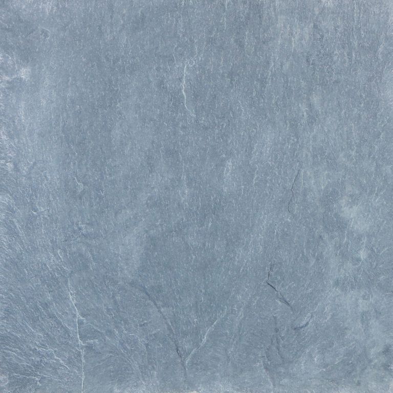 Feature image for Unfading Green Slate. The surface finish shown is natural cleft. Dominant colors shown are blue and gray. The color mix creates a cool feeling. Regular color pattern.