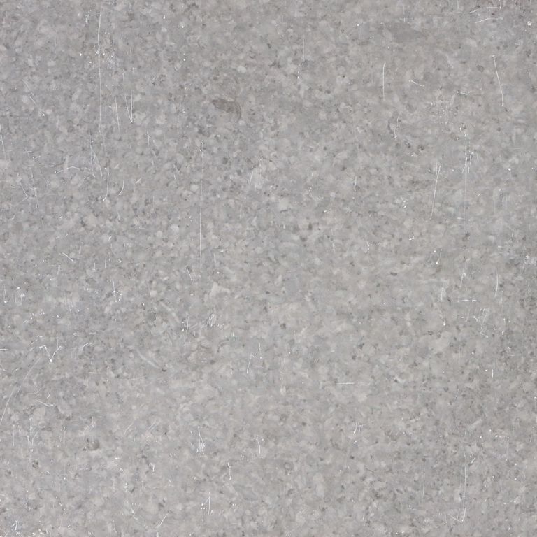The surface finish shown is honed. The dominant color shown is gray. The color mix creates a cool feeling. Blotched color pattern.
