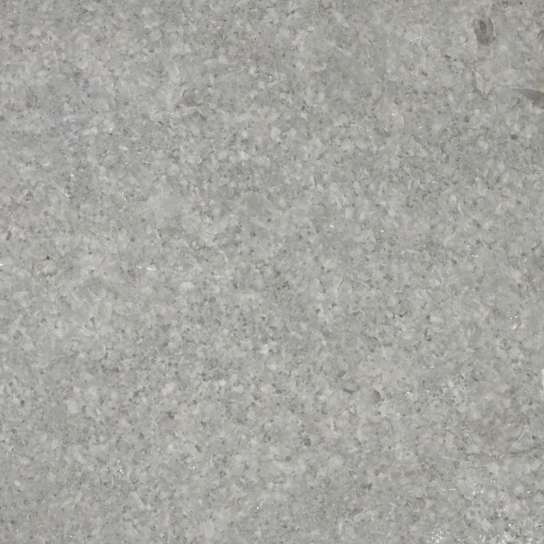 Feature image for Northern Bay Limestone. The surface finish shown is antiqued. The dominant color shown is gray; with beige, orange/rust and tan secondaries. The color mix creates a cool feeling. Regular and fine speckled color patterns.