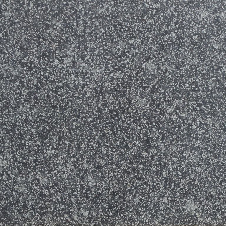 Color/Finish variation image for Basalt - Flor De Camomila. The surface finish shown is honed. The dominant color shown is gray. The color mix creates a cool feeling.