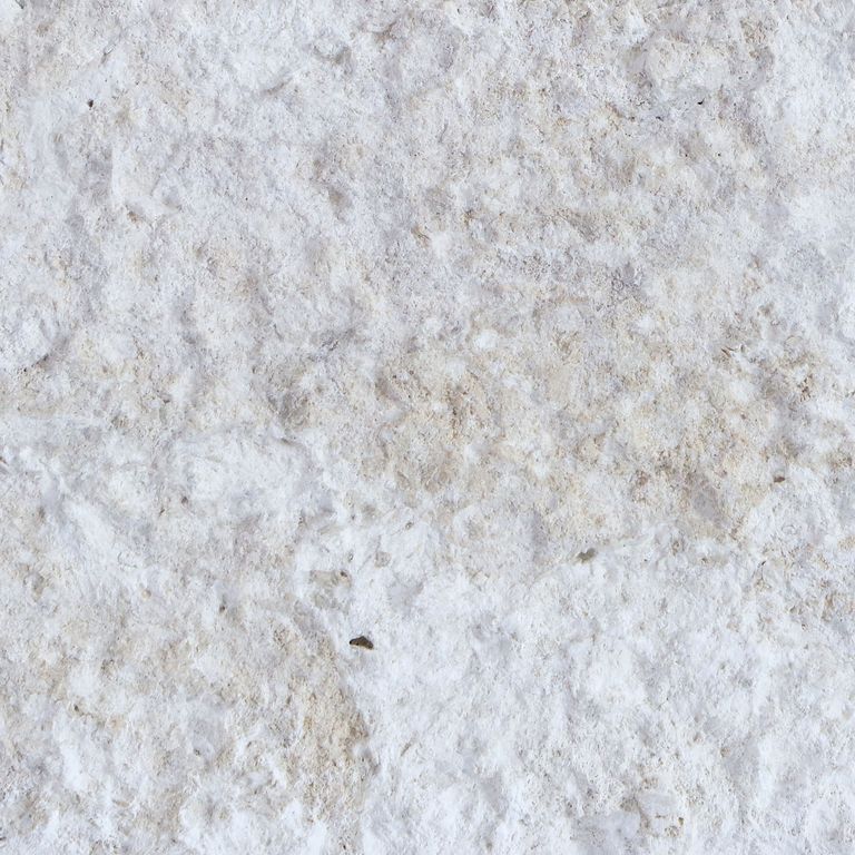 The surface finish shown is coarse bush hammered. Dominant colors shown are gray, pink and white. The color mix creates a cool feeling. Fine speckled and blotched color patterns.