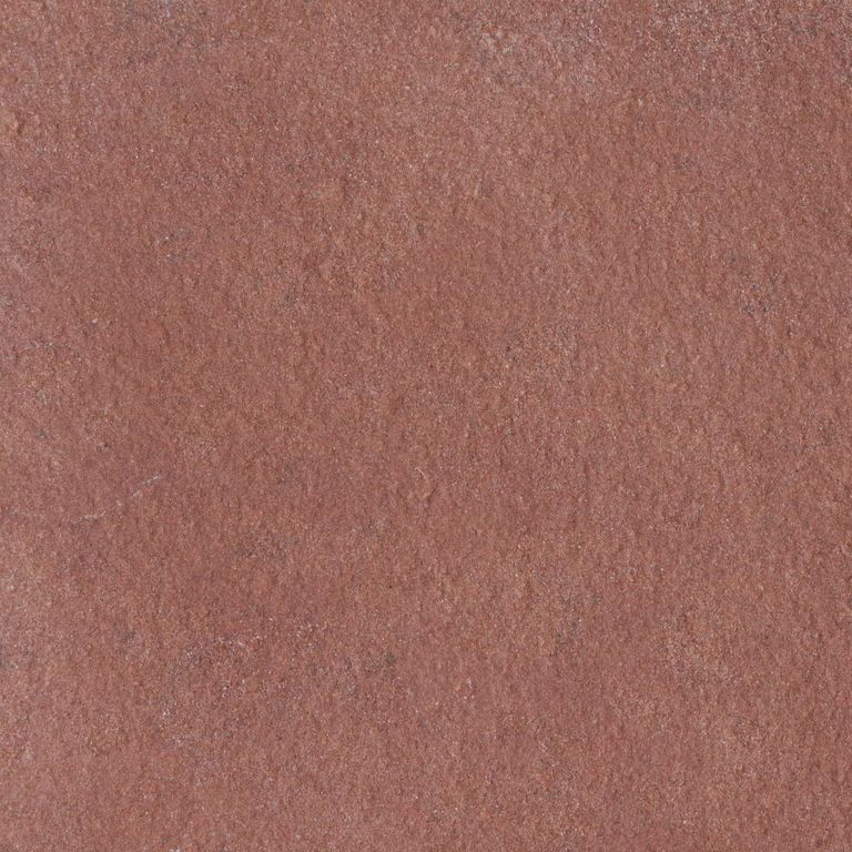 Feature image for Capsic Red Sandstone. The surface finish shown is sand blasted. The dominant color shown is red. The color mix creates a warm feeling. Solid color pattern.