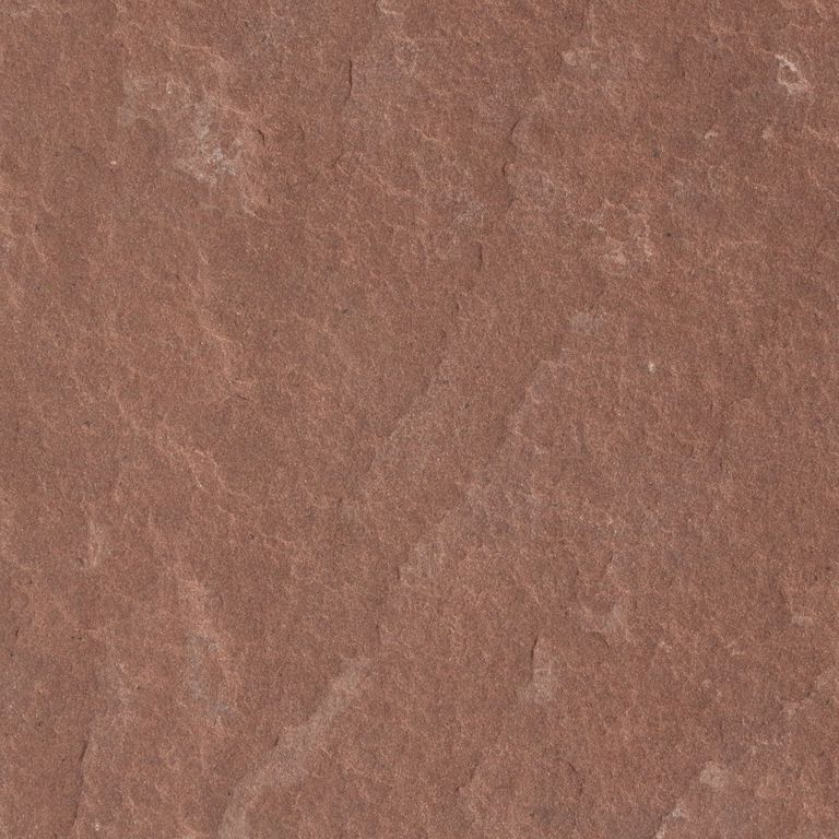 Feature image for Sandstone - Nube Red. The surface finish shown is flamed. Dominant colors shown are brown and tan. The color mix creates a warm feeling. Solid color pattern.