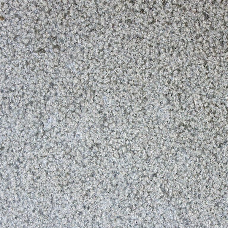 Feature image for Italian Classico Bluestone. The surface finish shown is bush hammered. The dominant color shown is gray. The color mix creates a cool feeling. Speckled color pattern.