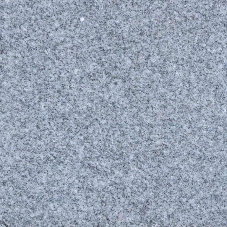 Feature image for Chatham Blue Granite. The surface finish shown is . Dominant colors shown are blue and gray. The color mix creates a cool feeling. Fine speckled color pattern.