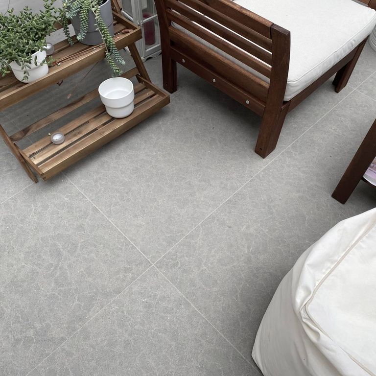 Application image for Limestone - Casablanca. The image shows this material being used in an interior floor application. The dominant color shown is gray. The color mix creates a cool feeling.