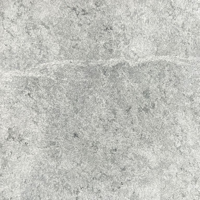 Feature image for Stoughton Pond Soapstone. The surface finish shown is honed. Dominant colors shown are green, gray and white. The color mix creates a cool feeling. Regular and veined color patterns.