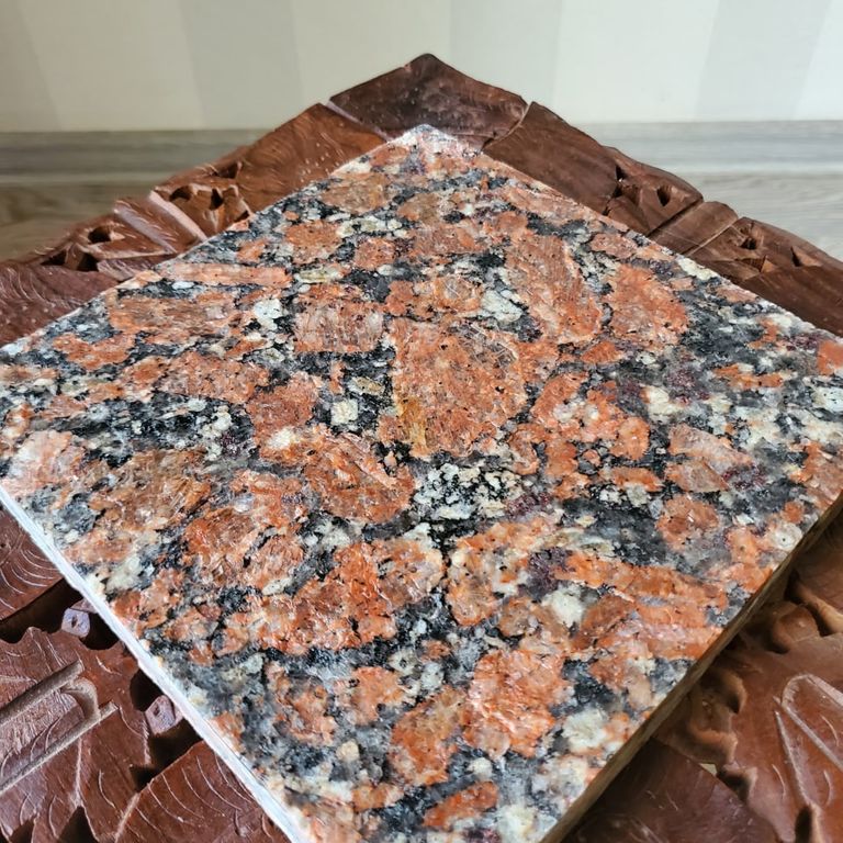 Best close-up image for Granite - Red Crystal. Dominant colors shown are black, gray, red and white.
