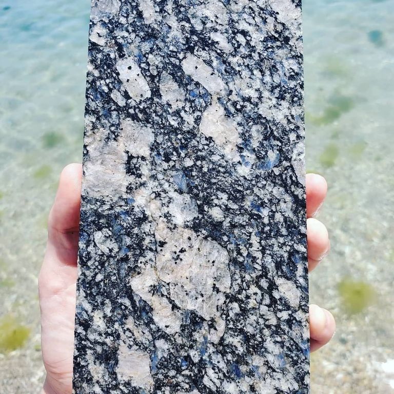 Feature image for Granite - Gray Leopard. Dominant colors shown are black, gray and white. The color mix creates a cool feeling.