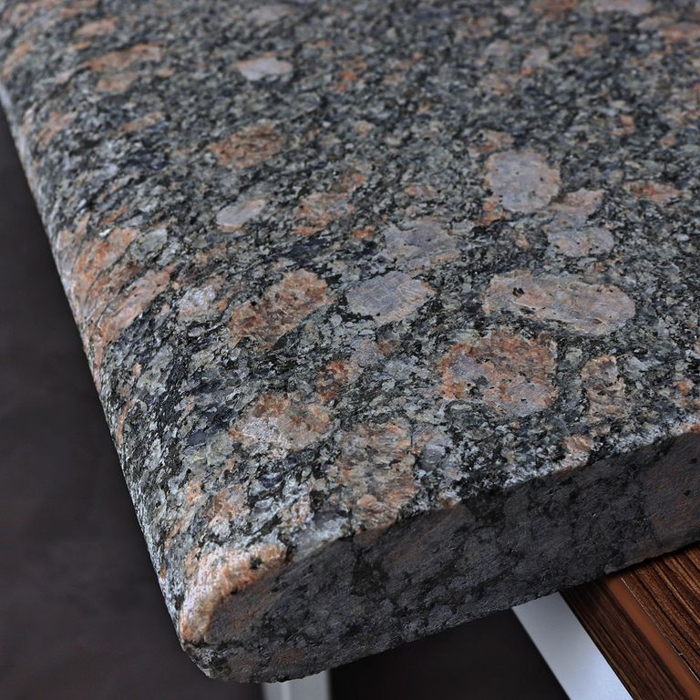 Best close-up image for Granite - Pink Leopard. Dominant colors shown are black, gray and pink.