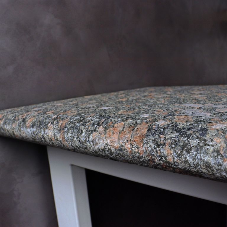 Application image for Granite - Pink Leopard. Dominant colors shown are black, gray and pink. The color mix creates a cool feeling.