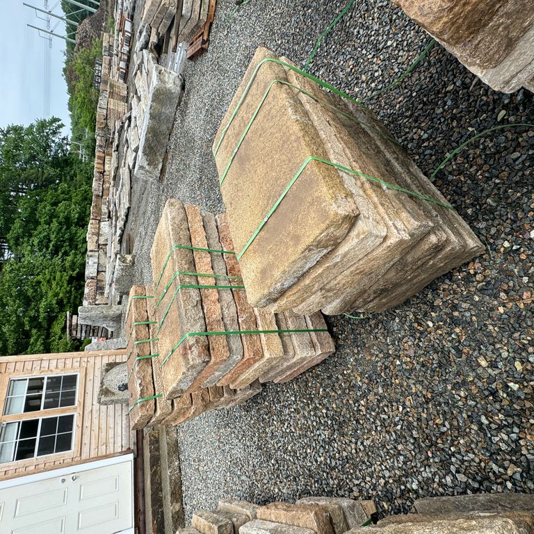 Feature image for Granite - Reclaimed Rustic Planks - Golden 4x2'. The surface finish shown is split-face. Dominant colors shown are gray and tan. The color mix creates a warm feeling.