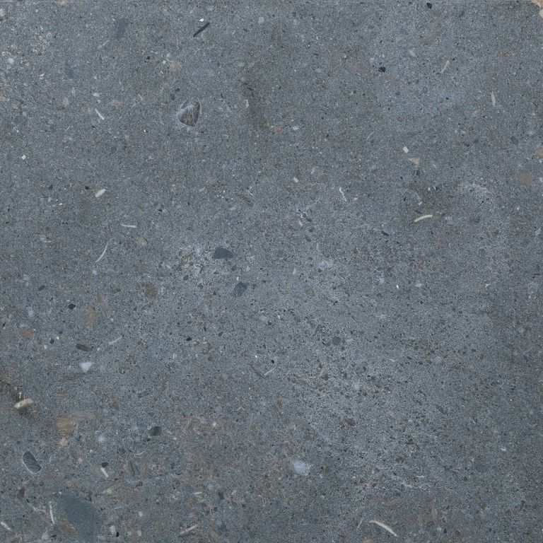 Color/Finish variation image for Montserrat Gray Limestone. The surface finish shown is brushed. Dominant colors shown are blue and gray. The color mix creates a cool feeling.