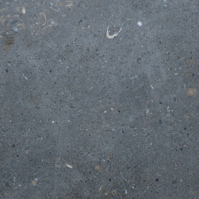 Color/Finish variation image for Montserrat Gray Limestone. The surface finish shown is honed. Dominant colors shown are blue and gray. The color mix creates a cool feeling.