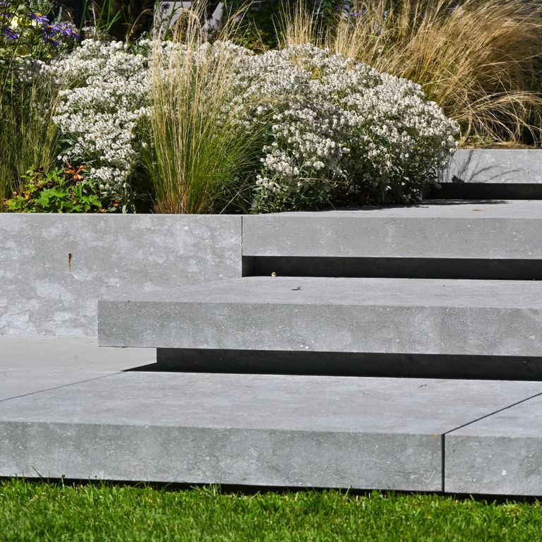 Application image for Montserrat Gray Limestone. The image shows this material being used for landings and treads. The dominant color shown is gray. The color mix creates a cool feeling.