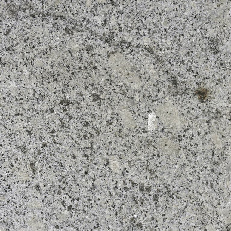 Color/Finish variation image for Oak Mountain Granite. The surface finish shown is flamed. The dominant color shown is gray; with beige, green and white secondaries. Exhibits 