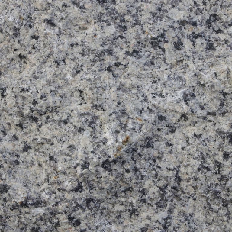 Color/Finish variation image for Reclaimed Granite Curbstone - Junior. The dominant color shown is gray; with black, blue, green, purple and white secondaries. Exhibits 