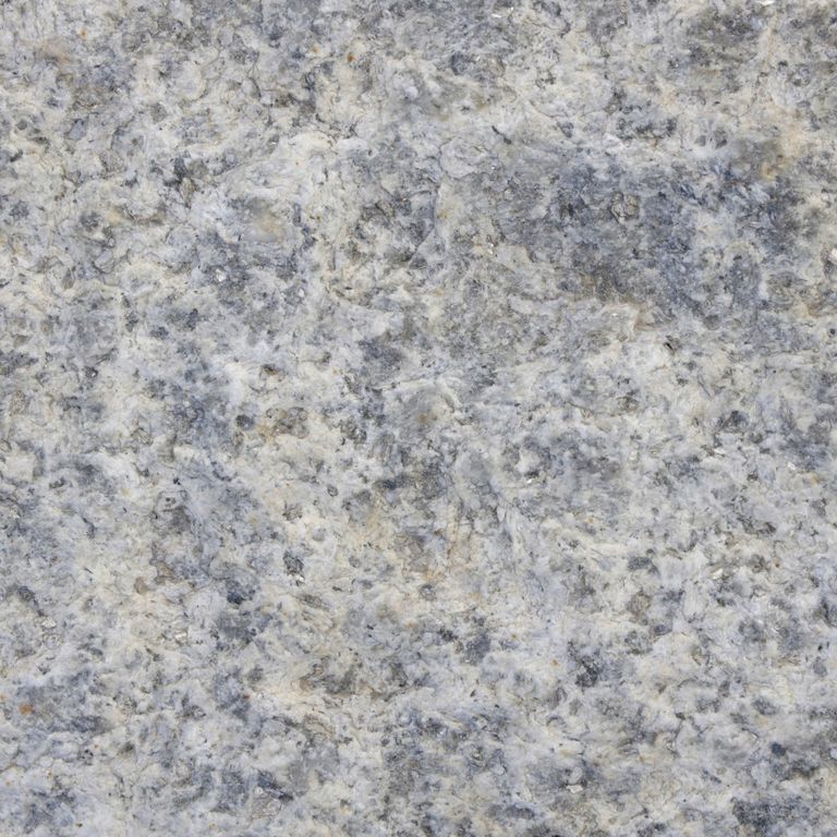 Color/Finish variation image for Reclaimed Granite Curbstone - Junior. The dominant color shown is gray; with beige, blue and white secondaries. The color mix creates a cool feeling. Speckled, coarse speckled and blotched color patterns.