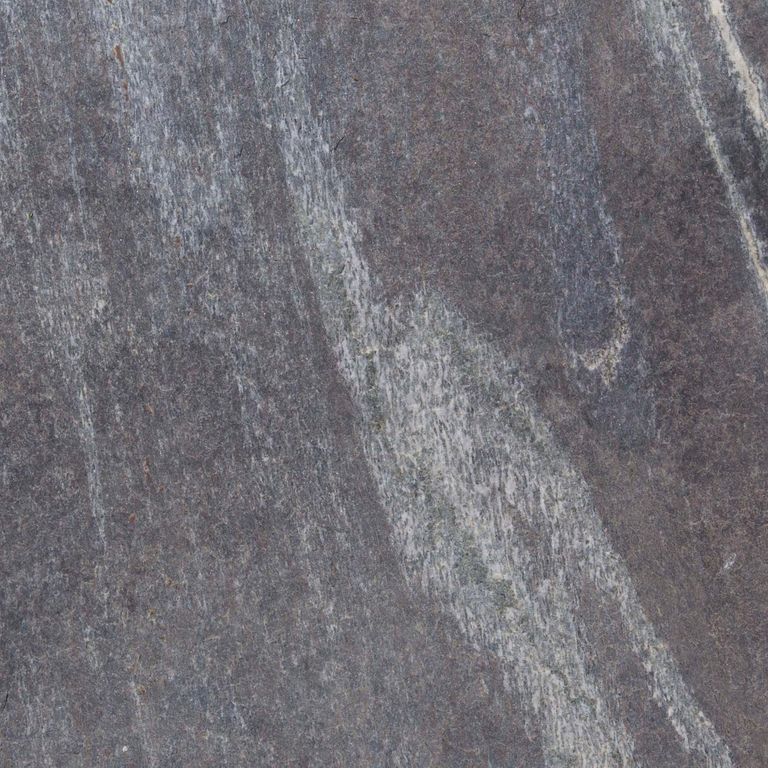 Color/Finish variation image for Granite - Mystic Mountain- Flamed. The dominant color shown is gray; with blue, brown, green and purple secondaries. Exhibits 