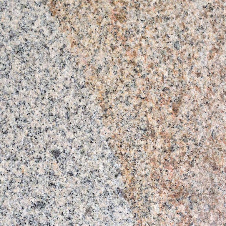 Color/Finish variation image for Granite - Cape Neddick Full Color. The surface finish shown is flamed. The dominant color shown is beige; with beige, brown, green, pink, white, tan and cream secondaries. The color mix creates a warm feeling. Speckled, blotched and coarse speckled color patterns. Contains lots of mica.
