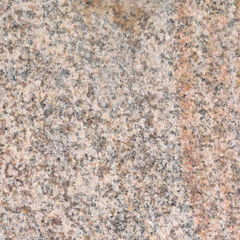 Color/Finish variation image for Granite - Cape Neddick Full Color. The surface finish shown is flamed. Dominant colors shown are beige, orange/rust and tan; with brown, purple, white and cream secondaries. Exhibits 