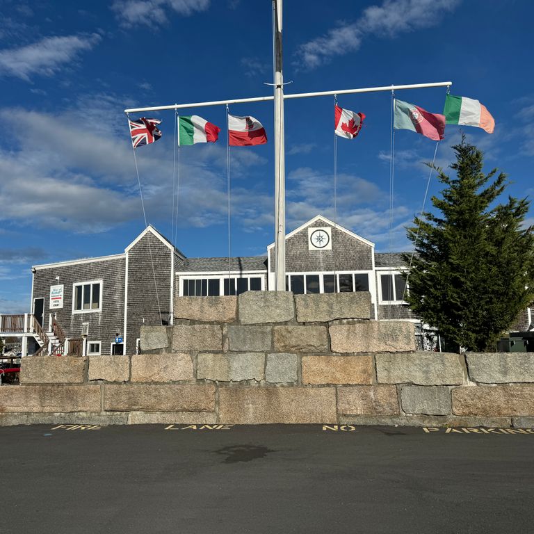 Application image for Granite - Reclaimed Bridge Blocks. The image shows this material being used in a landscape wallstone application. The dominant color shown is gray.