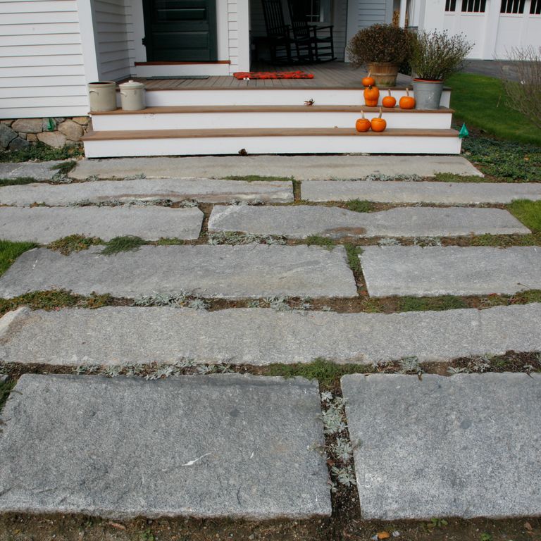 The image shows this material being used in a path pavers application. The dominant color shown is gray; with a beige secondary. The color mix creates a cool feeling. Regular color pattern.