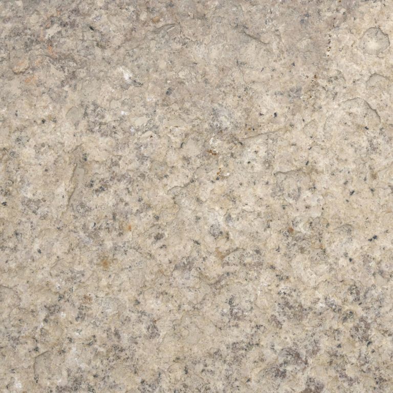 Color/Finish variation image for Reclaimed Footworn Granite Planks. Dominant colors shown are beige and tan; with brown, gray, orange/rust and cream secondaries. The color mix creates a warm feeling. Speckled, blotched and cloudy color patterns.