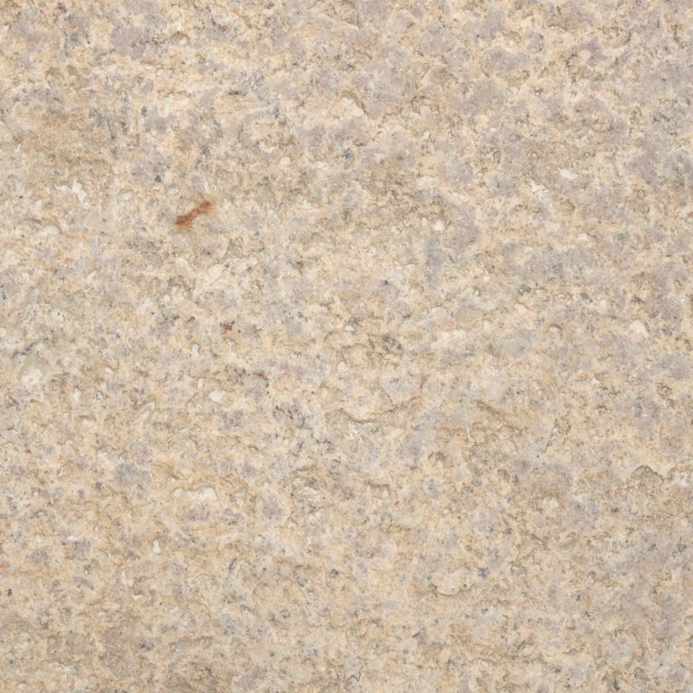 Color/Finish variation image for Reclaimed Footworn Granite Planks. Dominant colors shown are beige and tan; with brown, orange/rust and cream secondaries. The color mix creates a warm feeling. Speckled and cloudy color patterns.