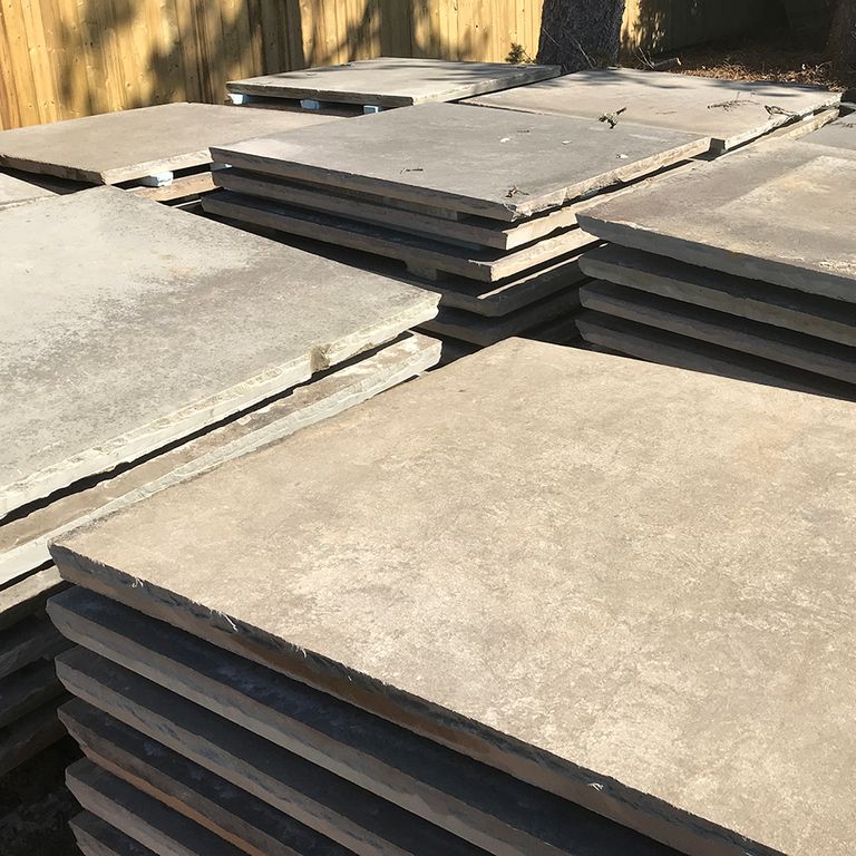 Close-up image for Reclaimed Sandstone Sidewalk Stones. The surface finishes shown are weathered and worn. Dominant colors shown are beige and tan; with brown, gray, orange/rust and cream secondaries. The color mix creates a warm feeling. Regular, blotched and cloudy color patterns.