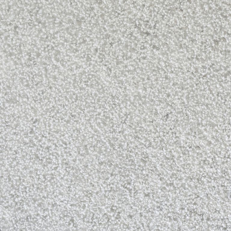 Color/Finish variation image for Mountain Hard Limestone - Blue. The surface finish shown is bush hammered. Dominant colors shown are gray and white. The color mix creates a cool feeling. Speckled and fine speckled color patterns.