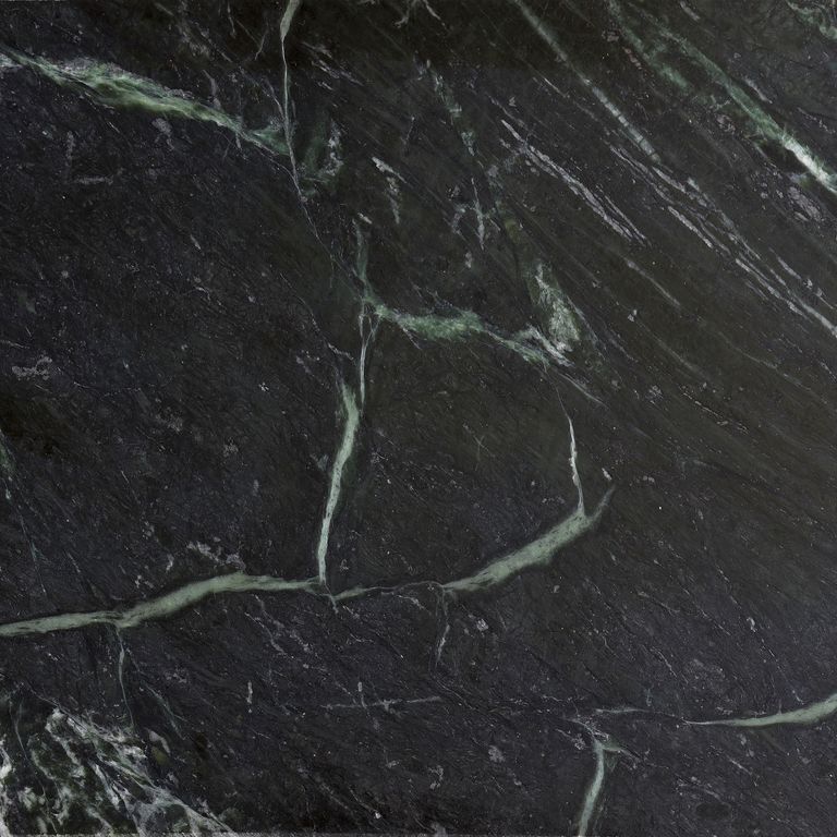 Best close-up image for Vermont Verde Soapstone. The surface finish shown is antiqued. Dominant colors shown are black and green; with green, gray and white secondaries. Exhibits 