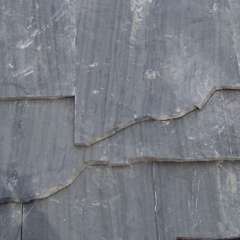 Close-up image for Slate - Vermont Slate - Striated Gray. The surface finish shown is natural cleft. The dominant color shown is gray; with blue and green secondaries. Exhibits 