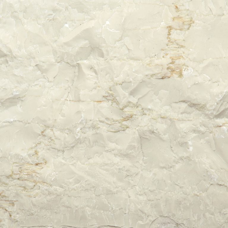 Color/Finish variation image for Mountain Hard Limestone - Beige. The surface finish shown is split-face. Dominant colors shown are beige and cream; with gray, white and tan secondaries. Exhibits 