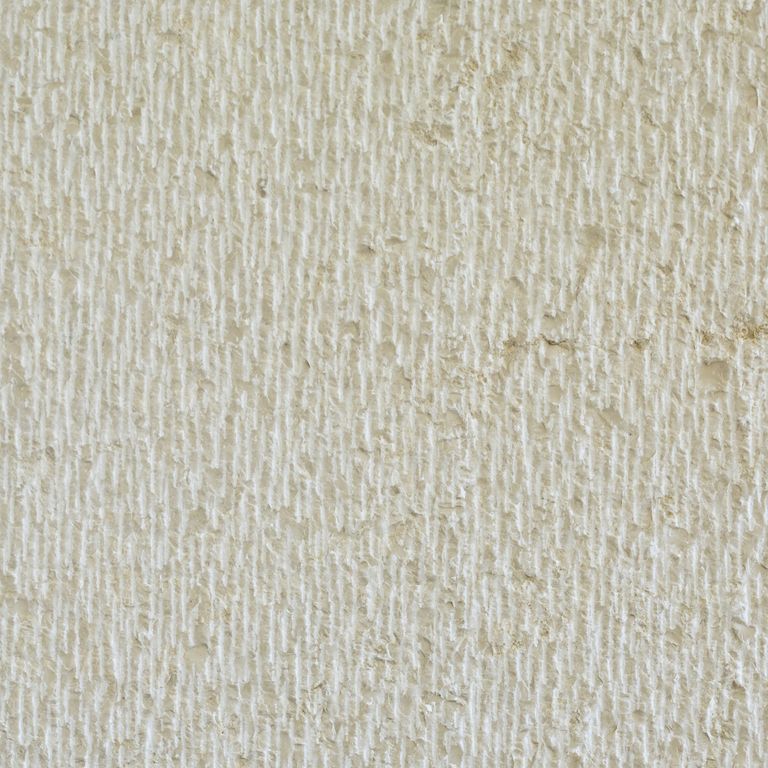 Color/Finish variation image for Mountain Hard Limestone - Beige. The surface finish shown is chiseled. Dominant colors shown are beige, gray and white; with tan and cream secondaries. The color mix creates a warm feeling. Speckled and linear color patterns.