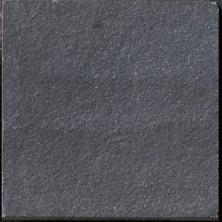 Color/Finish variation image for Limestone - Bahama Black. The surface finish shown is tumbled. The dominant color shown is gray; with black, brown and green secondaries. The color mix creates a cool feeling. Solid and fine speckled color patterns.