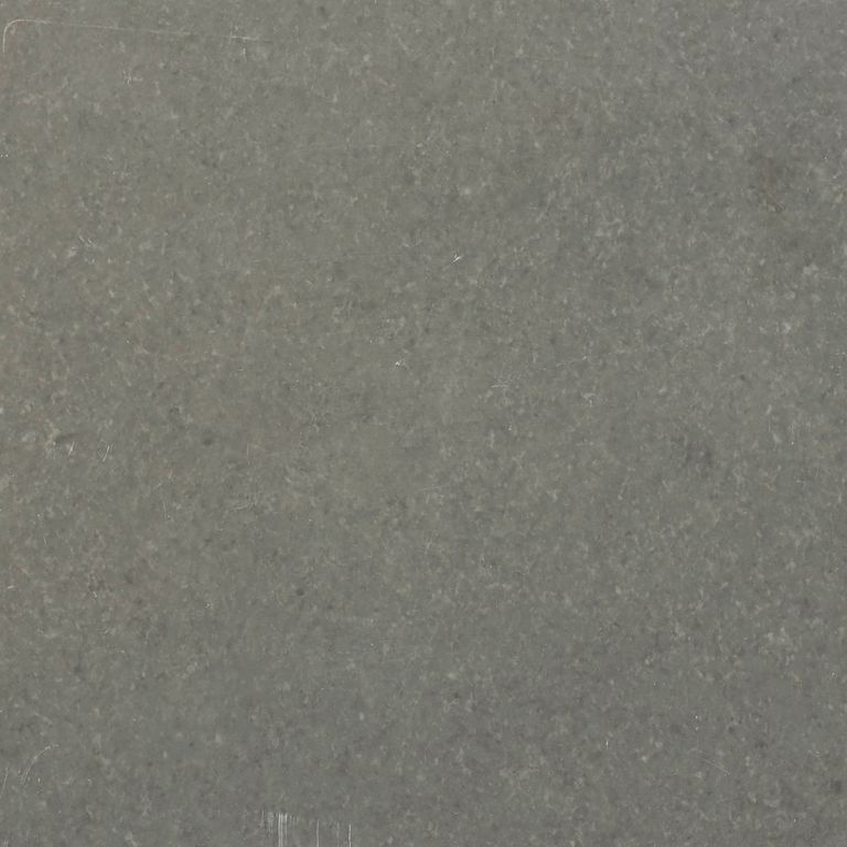 Color/Finish variation image for Riviera Limestone. The surface finish shown is sawn. Dominant colors shown are green and gray. Solid and cloudy color patterns.