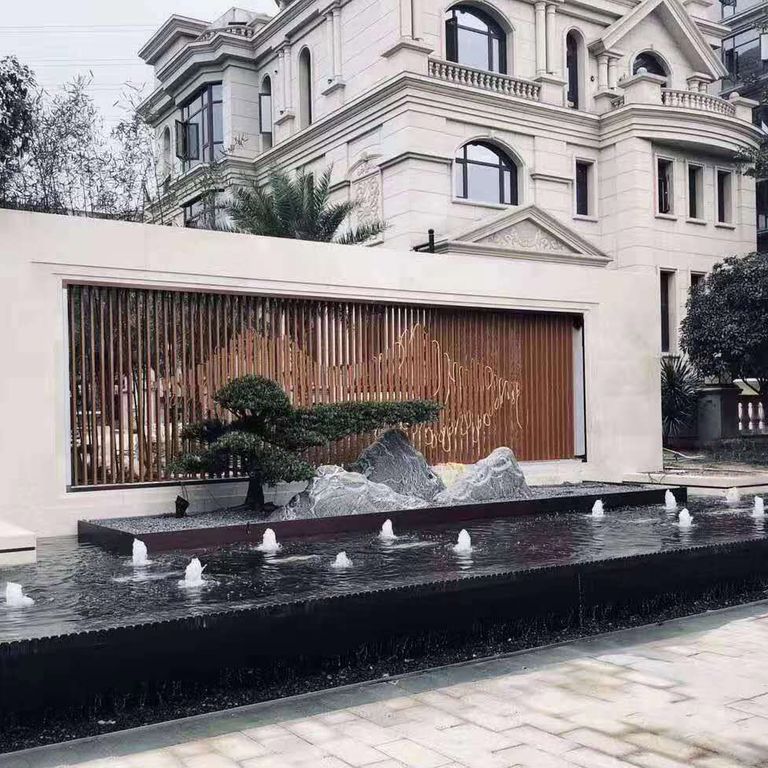 Application image for Nordic Black Basalt. The image shows this material being used in a fountains application. This is a building and landscape stone for indoor and outdoor commercial and residential applications. Suitable for general use, freeze-thaw conditions, low heat absorption surfaces, high traffic areas and low slipperiness surfaces situations. Moderate to higher on the price spectrum.