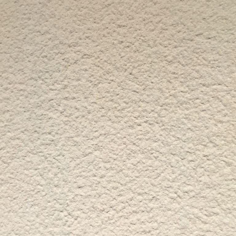 Color/Finish variation image for Portland Beige Sandstone. The surface finish shown is bush hammered. Dominant colors shown are beige and tan; with pink and cream secondaries. The color mix creates a warm feeling. Speckled color pattern.